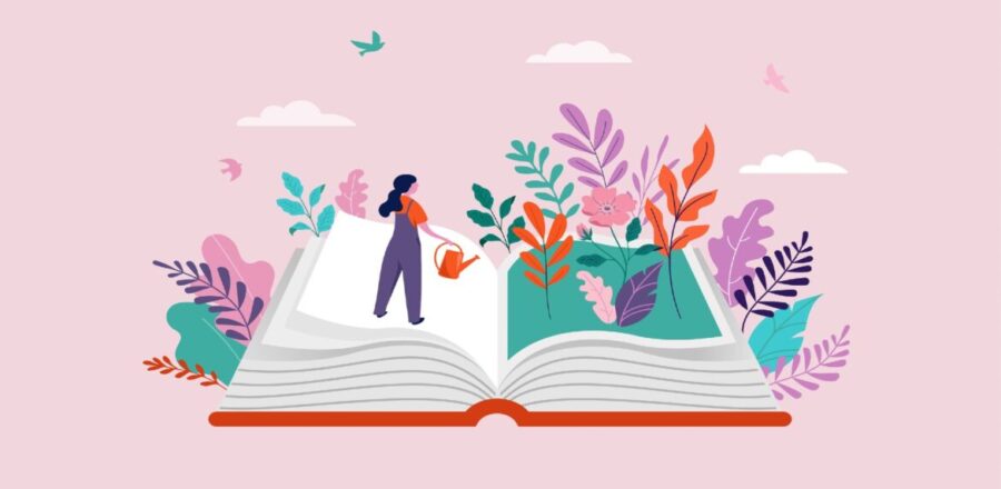 Illustration of a life-sized open book on a light pink background with a figure in purple overalls and an orange shirt standing on the left side of the book's pages. The illustration is holding a watering can over the right side pages of the book and flowers are sprouting out of the pages.